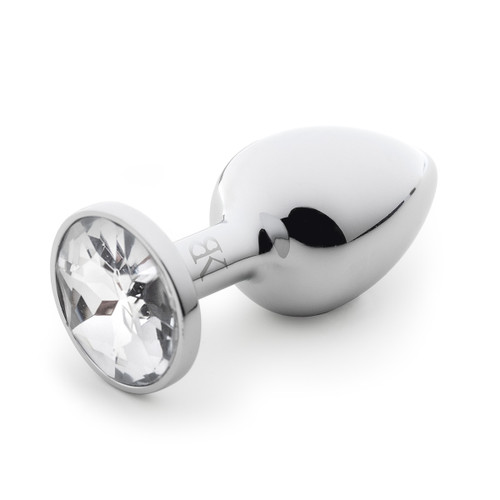 An angled view of the BOUGIE stainless steel anal plug showing off the clear plastic jeweled base