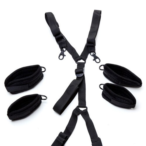 An image of the Fit to Be Tied under-bed restraints with the four cuffs removed, highlight how they can clip on and off for easy release and safety.