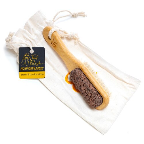 The Bedroom Kandi Foot Fetish brush & pumice stone with its cloth storage bag on a white background