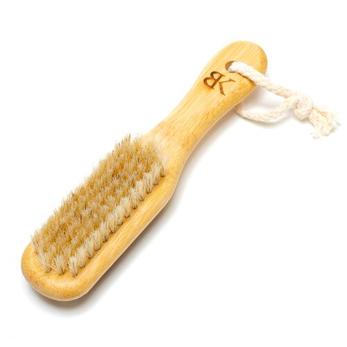 The brush side of the foot fetish brush by Bedroom Kandi for brushing away dead skin and cleansing your feet