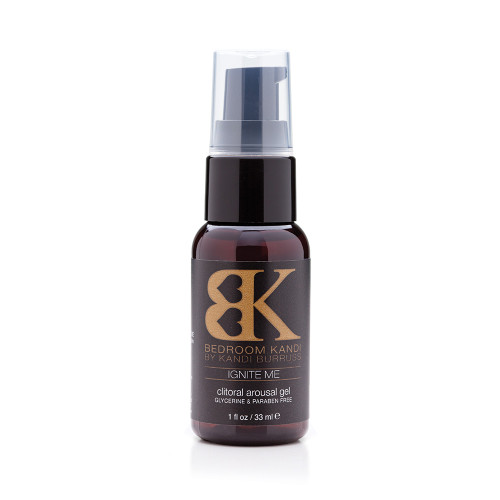 A one-ounce dark brown pump bottle with a black cap on a white background, containing Bedroom Kandi's Ignite Me Arousal Gel