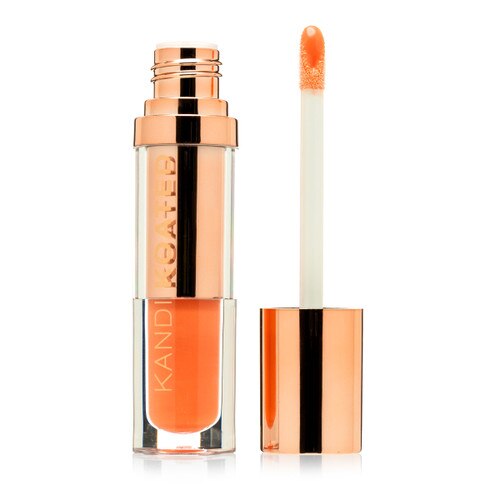 An open container of Lacquer “Vivacious”, a light orange peach. The rose gold cap with doe foot applicator stands beside it on a white background.