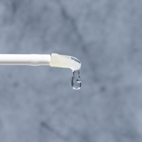 A closeup of the plush non-stick formula of lip drip by kandi koated on the applicator