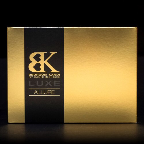 An image of the black and gold Luxe Allure packaging sitting on a black background.