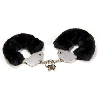 An image of of a pair of metal handcuffs lined in black faux fur lying on a white background. A ring with two small keys is attached to the short chain between the cuffs.
