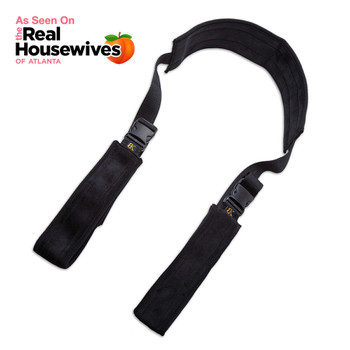 An image of the black Play with Me positioning strap featuring padded supports and adjustable straps. As seen on RHOA.