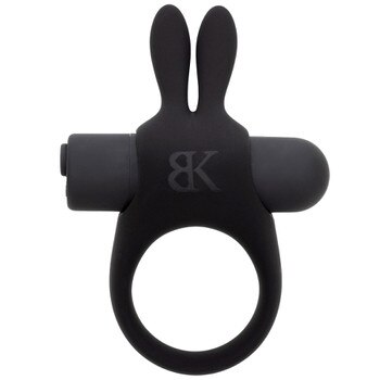 An overhead image of R and B, a couples ring featuring two tickler ears for her pleasure and an insertable vibrating bullet. The BK logo is embossed on one side.