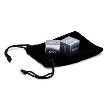 An image of our Roll Play sexy dice. Two brushed metal cubes sit on a black velvety pouch. Sexy actions or body parts are written on each face of the dice, such as 'kiss' or 'neck'.