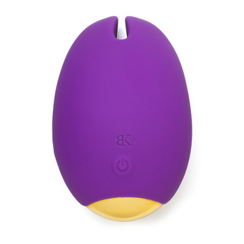 An image of Queen, a purple ovoid clitoral massager with a groove between two silicone prongs at one end and a golden cap on the other end.