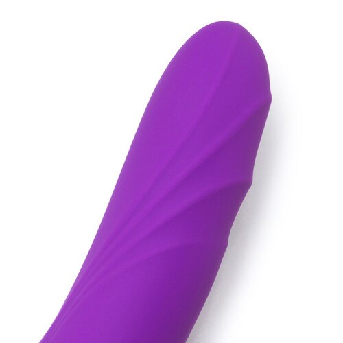A close up view of the tip of Your Highness, featuring a curve for g-spot stimulation and gentle flared ridging for added sensation.