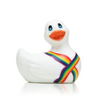 An image of the I Rub My Duckie massager, which resembles a rubber duck bath toy. The Pride duckie is white with an orange bill and rainbow stripes wrapped around its neck and chest.