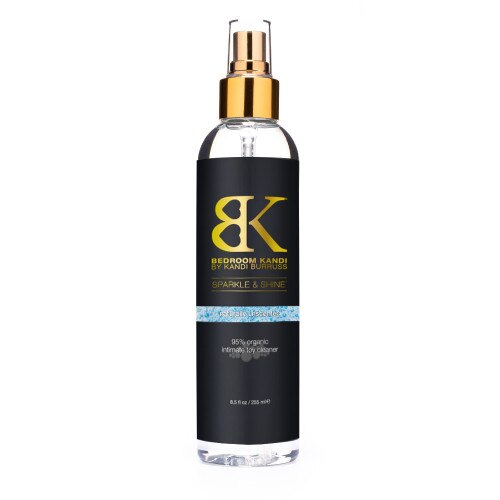 A picture of our Sparkle and Shine cleaning formula in a tall, rounded-top clear bottle with a gold spray cap.
