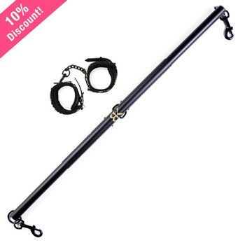 An image of the spread desire spreader bar extended with the bonds of desire wrist cuffs beside it.
