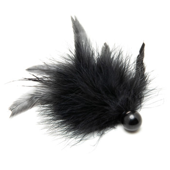 An image of the Touched By Desire feather tickler on a white background. The tickler is made of a soft cluster of feathers attached to a small spherical black handle.