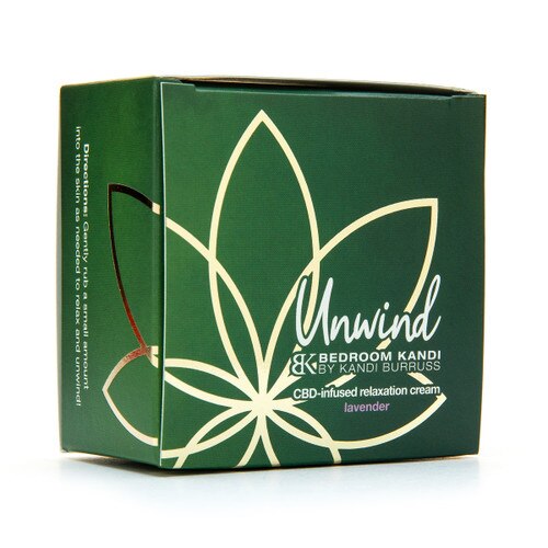 A green and gold cardboard box containing a jar of Unwind Relaxation Cream. The box is standing upright on a white background.