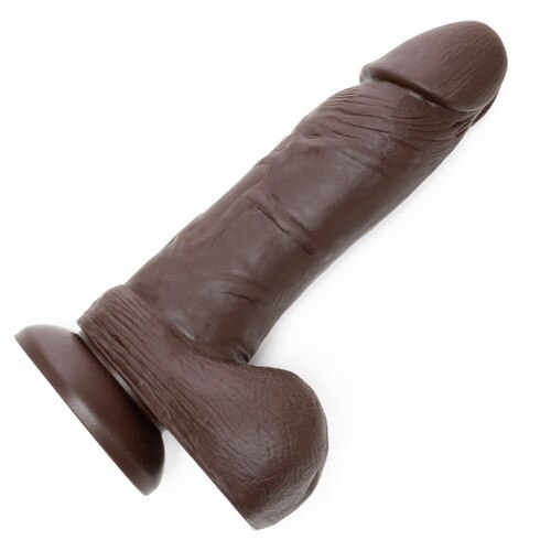 A side view of the realistically veined dark brown vibin D dildo