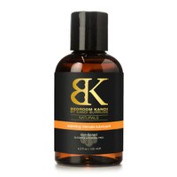 An image of a brown bottle with a black cap containing Bedroom Kandi's warming natural intimate lubricant.