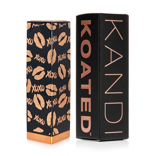 An image of the cocoa kisses specialty lipstick tube patterned with lip prints and 'xoxo' repeating. Beside it is the Kandi Koated lipstick box on a white background.