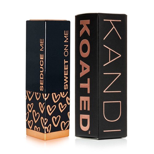 An image of the date night lipstick tube, with drawn hearts on the bottom in rose gold and the phrases 'seduce me' and 'sweet on me' written on the cap. Beside it is the lipstick box.